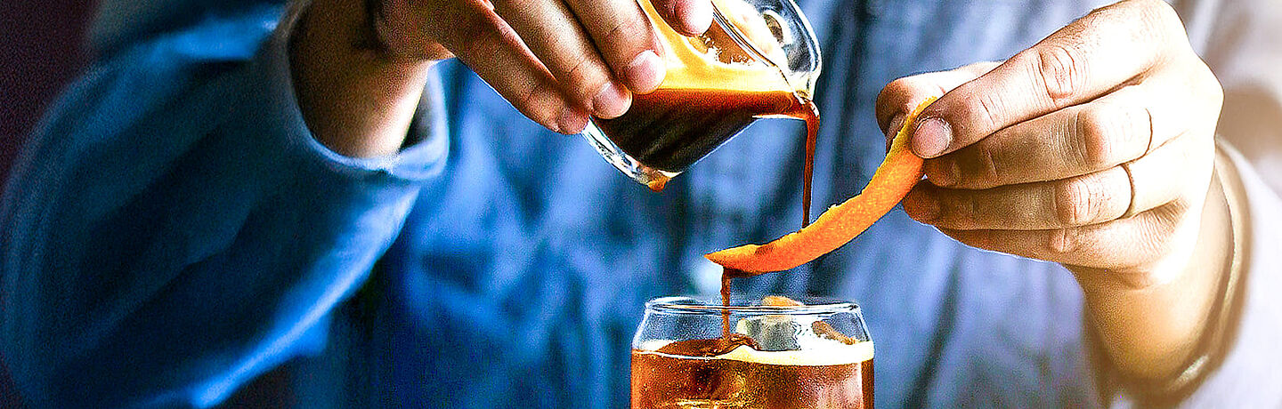Person pouring coffee
