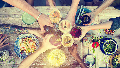 People toasting at a table