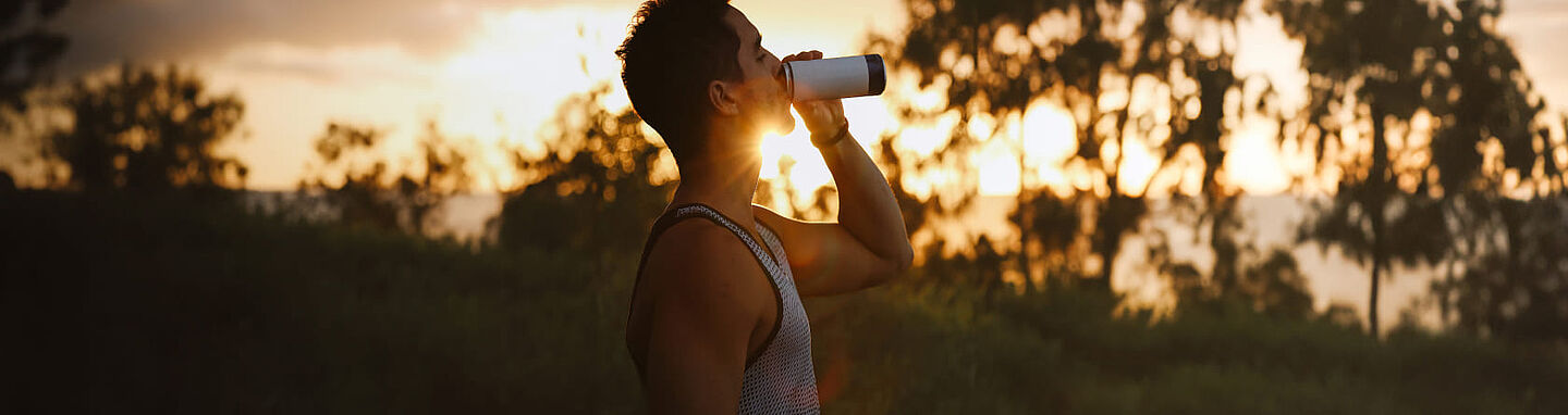 Person drinking an energy drink