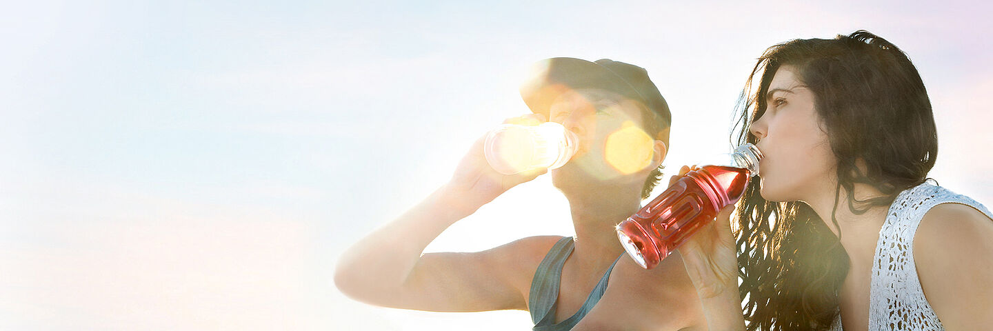 friends drinking red juice 