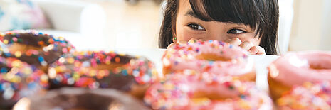 girl with donuts