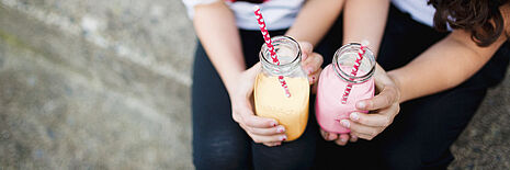 friends holding drinks