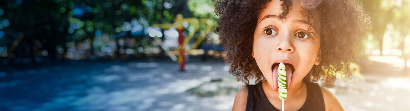  girl eating a lollipop